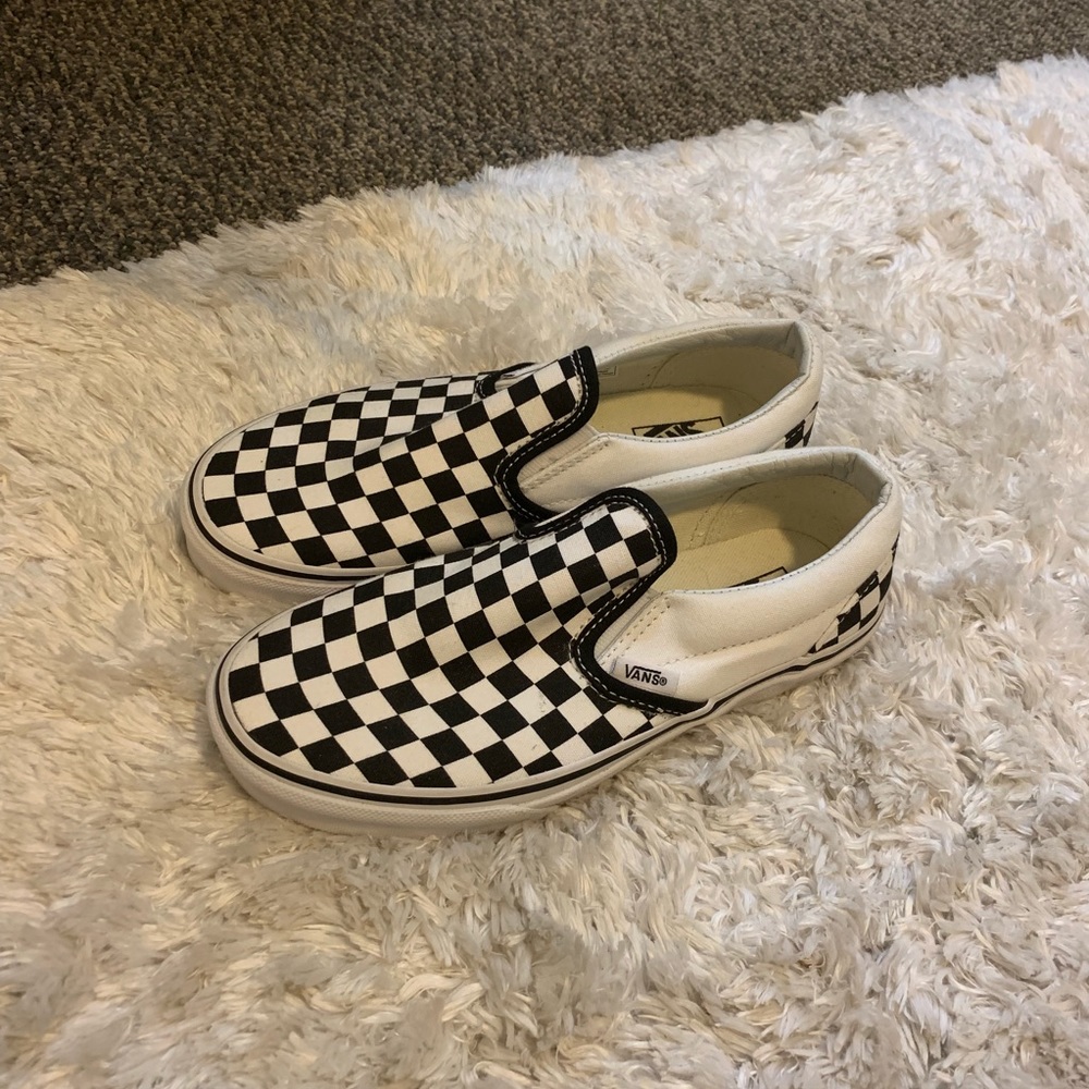 Checkered vans.